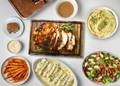 Please Note: This meal requires 1 week of prep time.
This meal comes with

Spring Green Salad
Cherry Tomato, Cucumber &amp; Sherry Vinaigrette

Farm Turkey Roll
Contains Dairy
12-14 lb Turkey deboned, Stuffed with Butter &amp; Herbs

Turkey Gravy
Contains Dairy, Gluten, Alcohol
Large 1000 ml

Spinach &amp; Ricotta Cannelloni
Served with White Wine Cream Sauce OR Tomato Basil Sauce&nbsp;

4 oz Grated Parmesan
Add on to pasta

Yukon Mashed Potatoes

Honey Roasted Baby Carrots

Tiramisu
